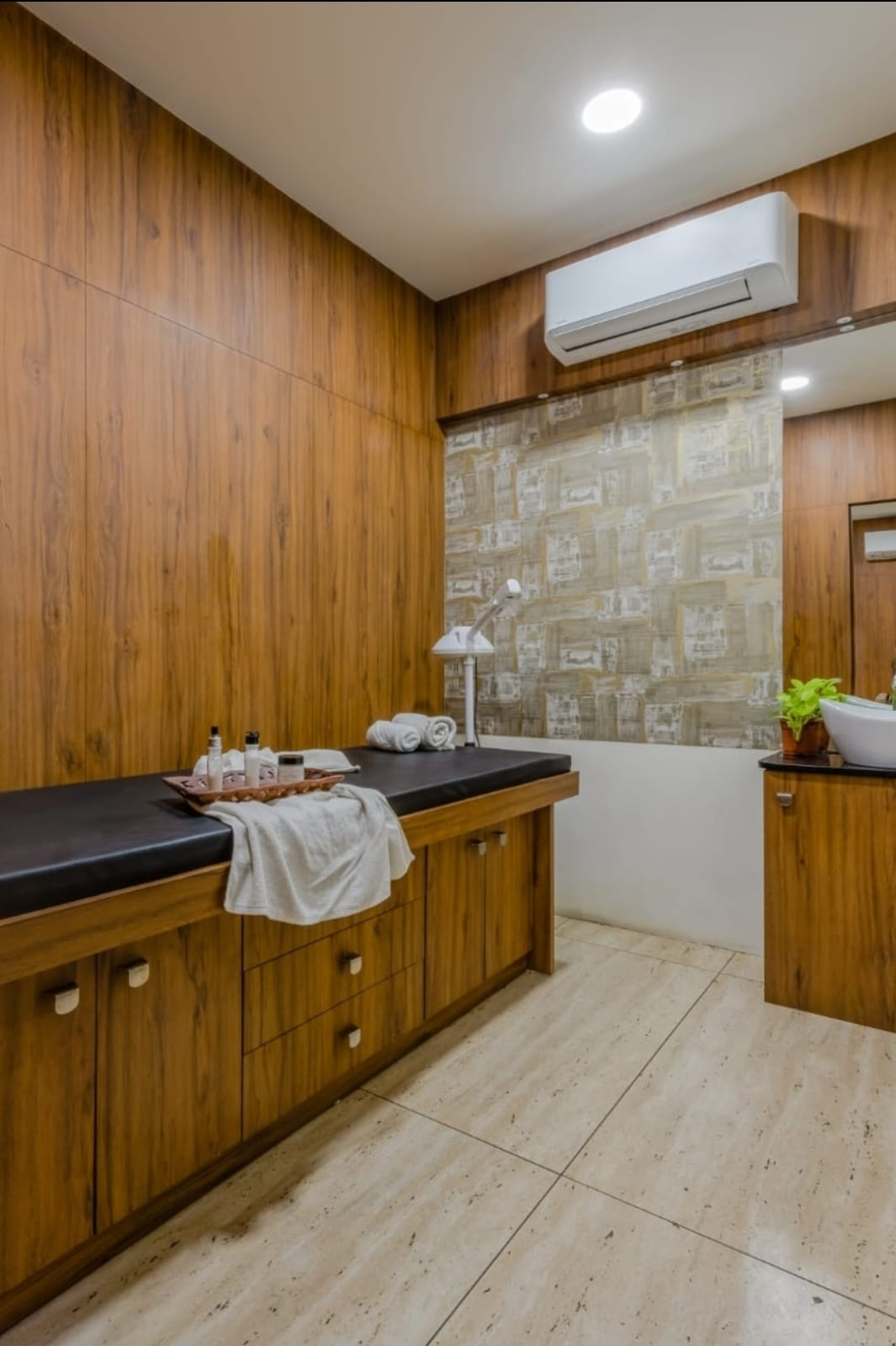Private treatment room with warm wood interior