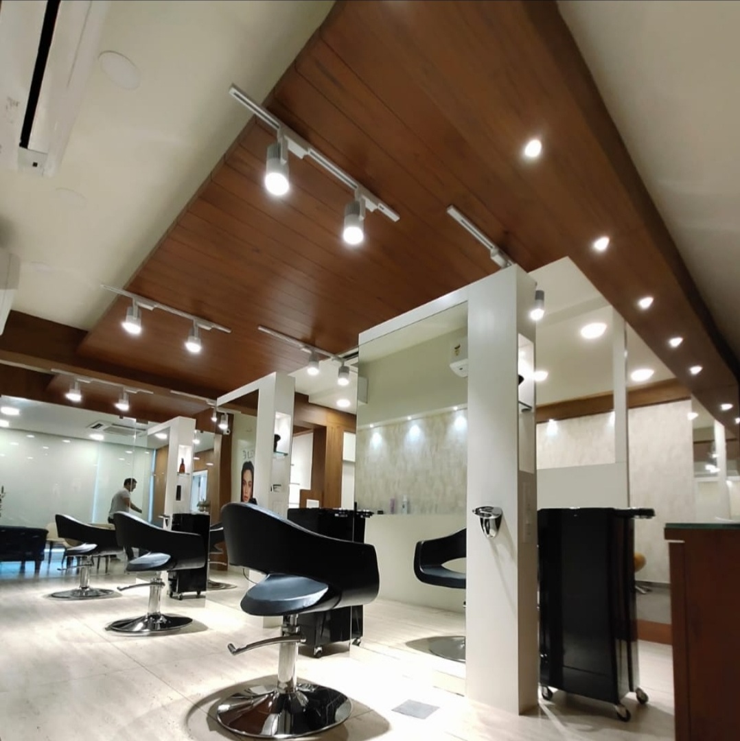 Styling floor with wood-panel ceiling and track lighting